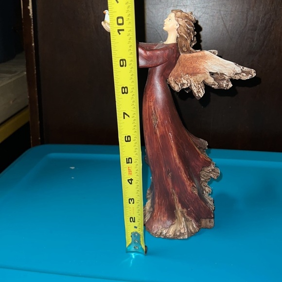 Christmas angel holding turtle dove looks like she’s part of a tree holiday deco - Picture 5 of 7